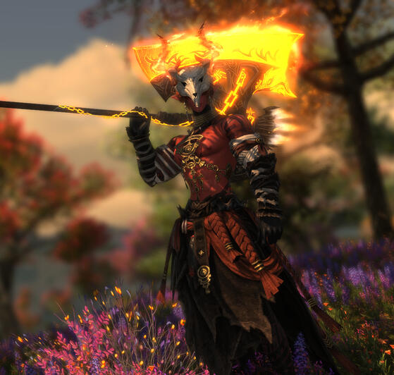 Large red skinned man in rags and bones wielding a large fiery axe.