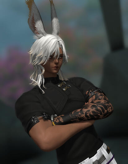 White haired bunny boy with light golden highlights at the very tips. Wearing a black martial arts top. Has a black flower tattoo going down their arm.