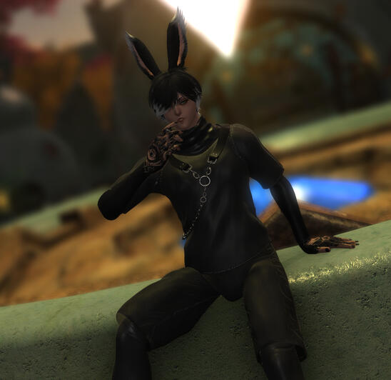 Black haired bunny boy with white highlights sitting near a large crystal holding a cigarette. Wearing a shirt and shorts with athletic wear underneath and some light chains on top.